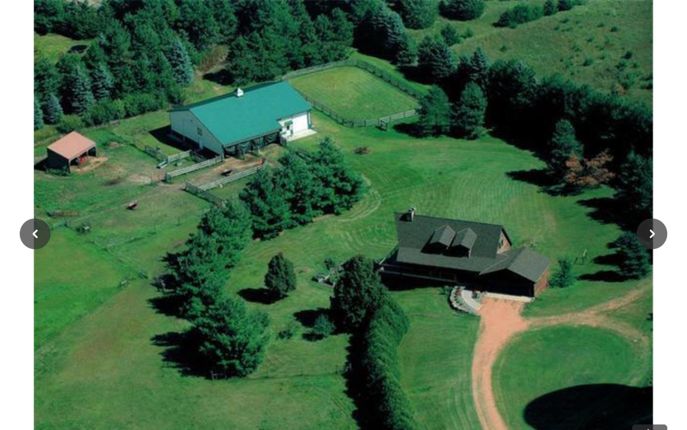 Aerial view of 6050 W 185th Street, barn and pasture